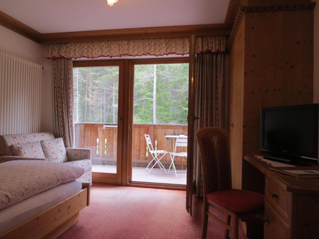 Hotel Ciasa Ai Pini San Cassiano  Pokoj fotografie