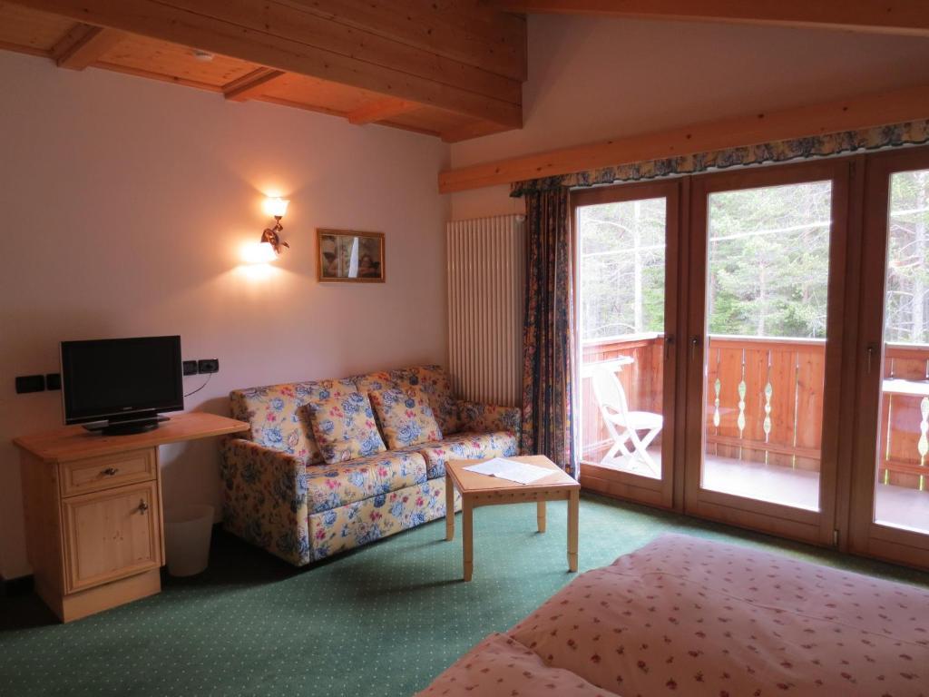 Hotel Ciasa Ai Pini San Cassiano  Pokoj fotografie